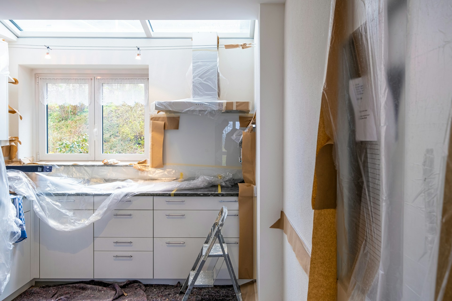 white wooden cabinet near window